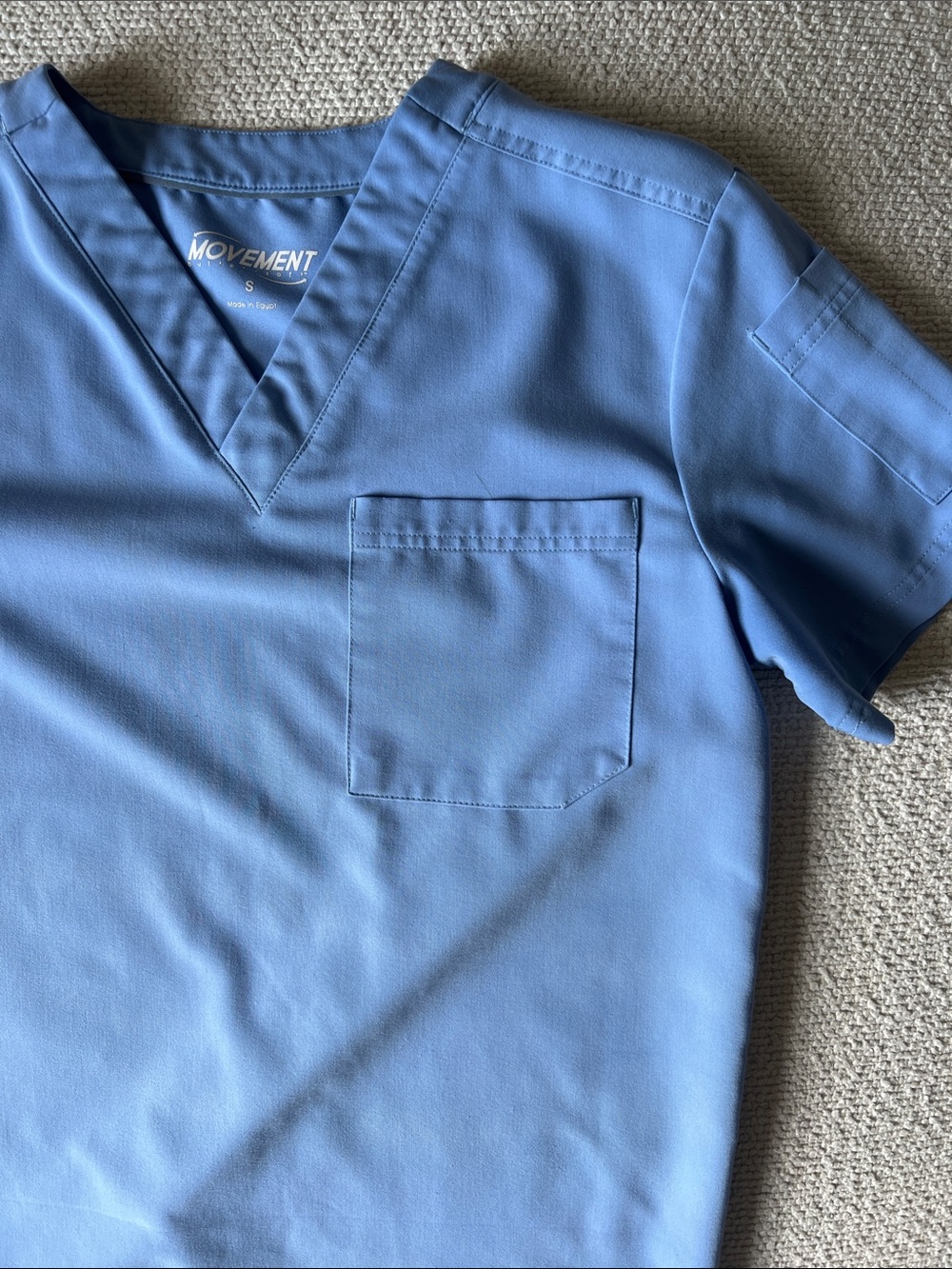 Scrub Set Top and Pants. Movement Buttersoft. Top and bottom men’s size Small.